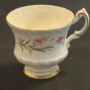 Fine bone china teacup with pink floral decoration by Paragon